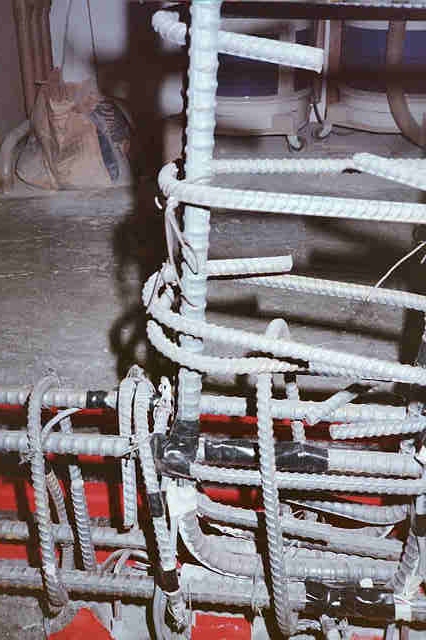 Close up of strain gage placement with steel parts attatched to each other.