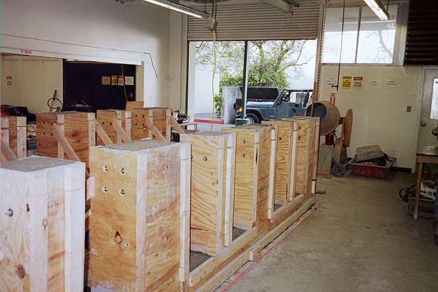 Placement June 12, 2000. Multiple wooden rectangle shaped figures.