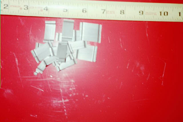 Pieces of the Bakaert Steel Fiber are shown with a ruler on top.